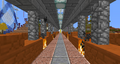 A walkway in the red sandstone wall