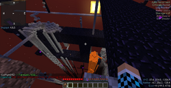 From Y 256, a heavily griefed section of the obsidian wall is visible.